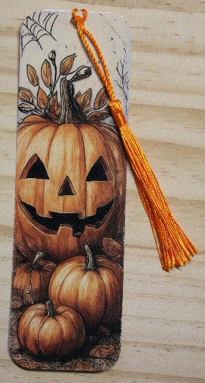 Jack O' Lantern pumpkin pile vinyl bookmark