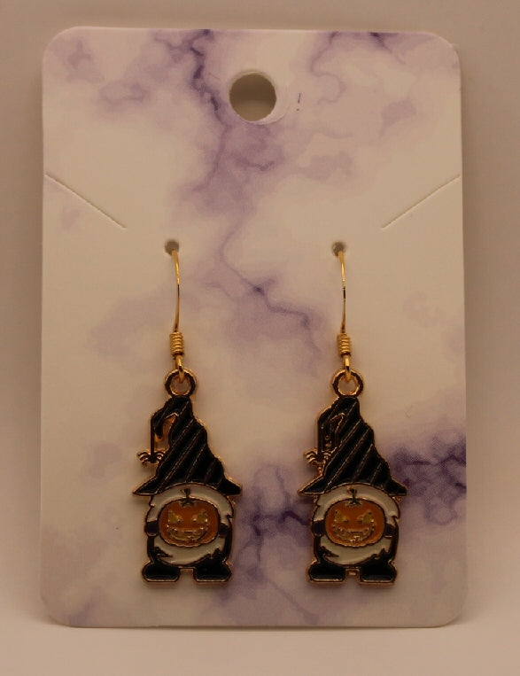 Pumpkin holding gnome dangle earrings