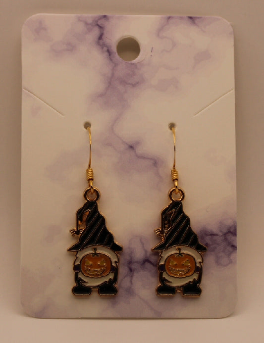 Pumpkin holding gnome dangle earrings
